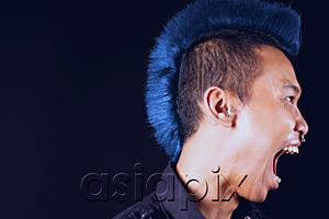 AsiaPix - Man with mohawk, side view, mouth open