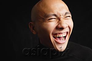 AsiaPix - Bald man, laughing, portrait