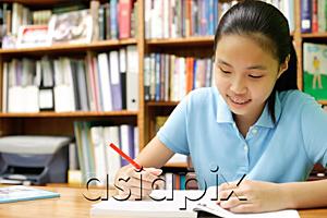 AsiaPix - Girl doing homework