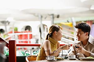 AsiaPix - Couple dining in cafe