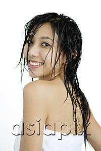 AsiaPix - Woman with wet hair, wrapped in a towel, looking over shoulder