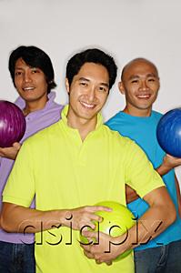 AsiaPix - Three men holding bowling balls, smiling at camera