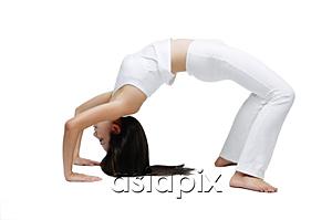 AsiaPix - Woman doing yoga, bridge position