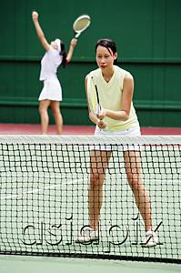 AsiaPix - Two women playing a game of tennis