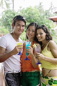 AsiaPix - Young adults holding cocktails, looking at camera