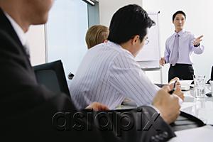AsiaPix - Executives listening to presentation