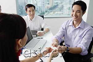 AsiaPix - Executives exchanging business card