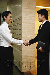 AsiaPix - Businessmen shaking hands