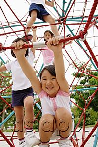 AsiaPix - Four girls at playground, climbing on jungle gym