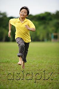 AsiaPix - Boy running on grass