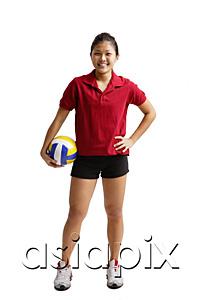 AsiaPix - Young woman holding volleyball, smiling at camera