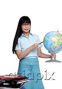 AsiaPix - Woman holding globe and pointing at it