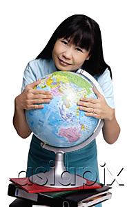 AsiaPix - Woman embracing globe, smiling