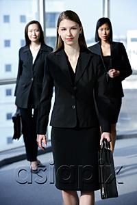 AsiaPix - Three businesswomen, facing camera