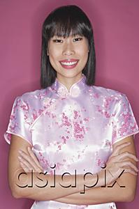 AsiaPix - Woman in pink cheongsam, arms crossed, smiling