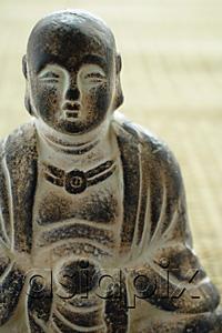 AsiaPix - Close-up of small Buddha sculpture