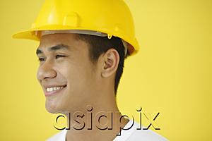 AsiaPix - Man wearing hardhat, smiling, head shot