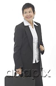 AsiaPix - Mature businesswoman with briefcase, looking away