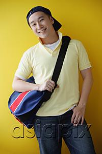 AsiaPix - Man wearing cap and carrying satchel