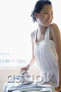 AsiaPix - Woman ironing, smiling at camera