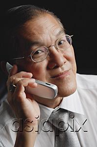 AsiaPix - Senior man with mobile phone