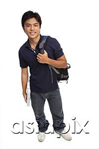 AsiaPix - Young man carrying books and a backpack