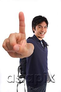 AsiaPix - Young man making hand sign