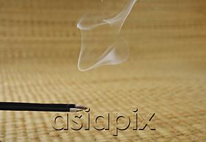 AsiaPix - Close up of burning incense sticks