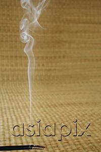 AsiaPix - Still life of burning incense sticks