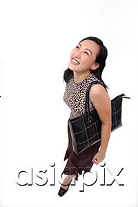 AsiaPix - Woman with shoulder bag, looking up