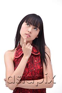AsiaPix - Young woman, finger on chin, looking up