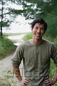 AsiaPix - Man outdoors, smiling at camera