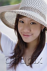 AsiaPix - Young woman wearing hat