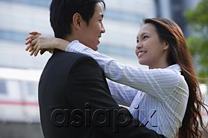 AsiaPix - Couple looking at each other, embracing