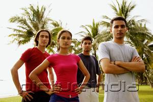 PictureIndia - Young adults standing, looking at camera