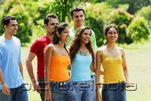 PictureIndia - Group of friends walking in park
