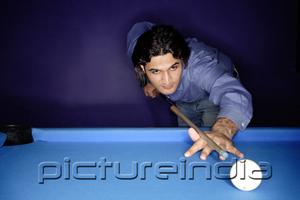 PictureIndia - Man playing pool