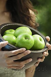 Mind Body Soul - hands holding bowl of apples