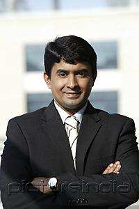PictureIndia - business man with arms crossed