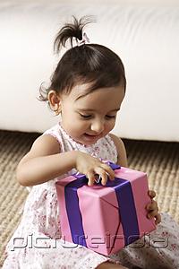 PictureIndia - toddler girl opening present