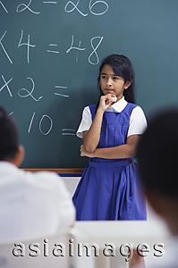 Asia Images Group - girl at chalkboard