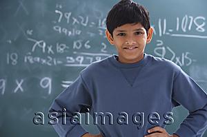 Asia Images Group - boy with hands on hips, gray sweatshirt