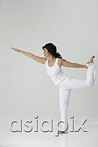 AsiaPix - Woman practicing yoga
