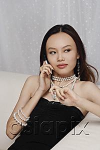 AsiaPix - Young woman on mobile phone