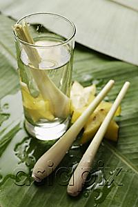 AsiaPix - lemon grass stalk in glass of water with star fruits