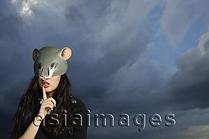 Asia Images Group - young lady with mouse mask