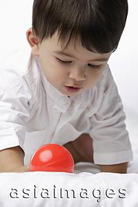 Asia Images Group - baby boy with red ball