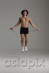 AsiaPix - man working out with jump rope