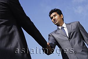 Asia Images Group - businessmen shaking hands