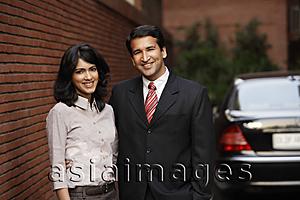 Asia Images Group - couple in front of car